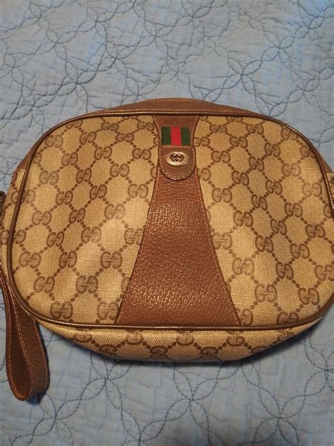 authentic vintage Gucci clutch